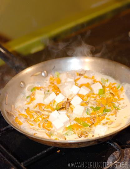 Cheese Added to Aji Amarillo Peppers, Onions and Cream by Wanderlust Designer